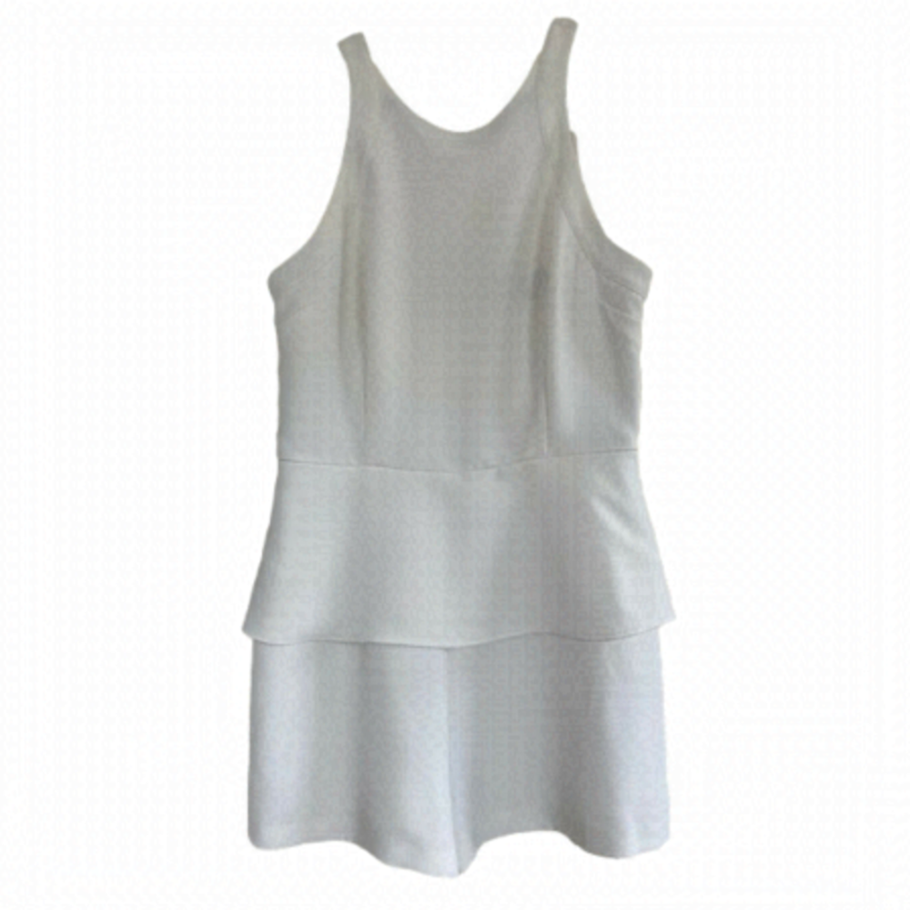 𝅺marciano white peplum zip back romper.